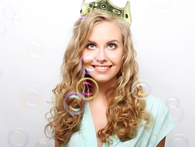Young lovely woman in crown