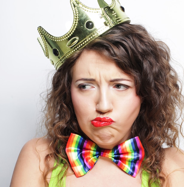 Young lovely woman with crown