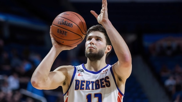 Young male basketball player taking a free throw