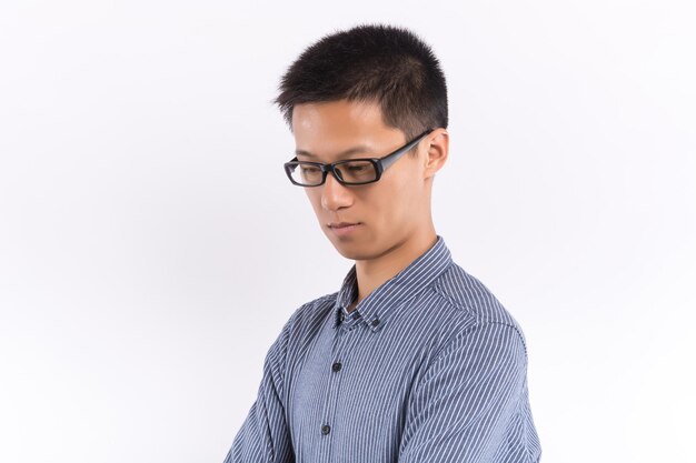 Young male in front of white background