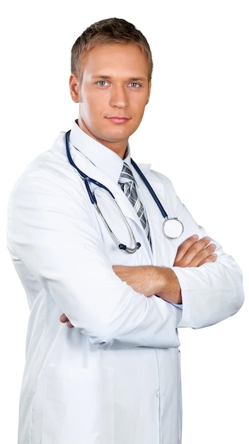 Young male physician standing with his arms crossed