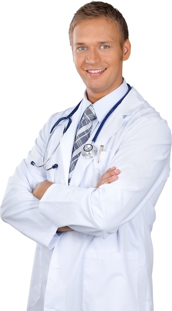 Young male physician standing with his arms crossed