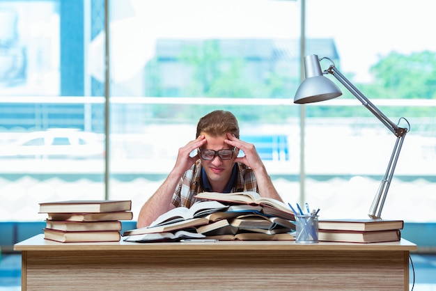 Young male student preparing for high school exams