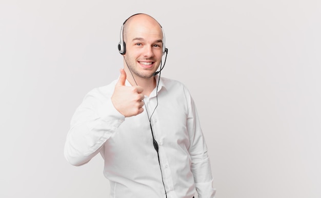 young man against flat color wall