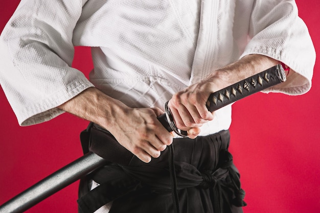 The young man are training Aikido at studio