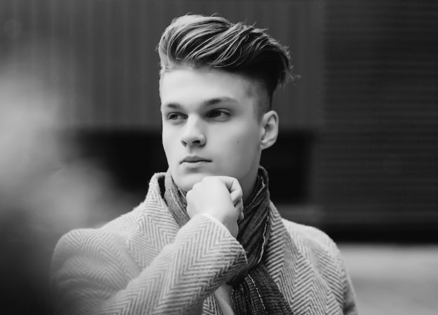 young man in autumn coat