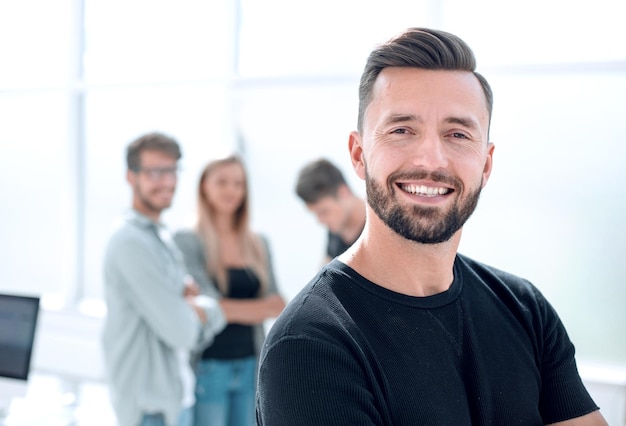 Young man in black Tshirt smiling