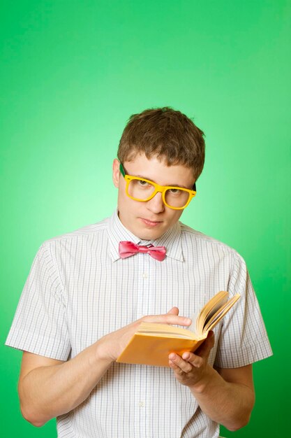 Young man bookworm reading