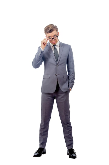 Young man in a business suit wearing glasses