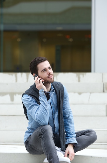 Young man calling by mobile phone