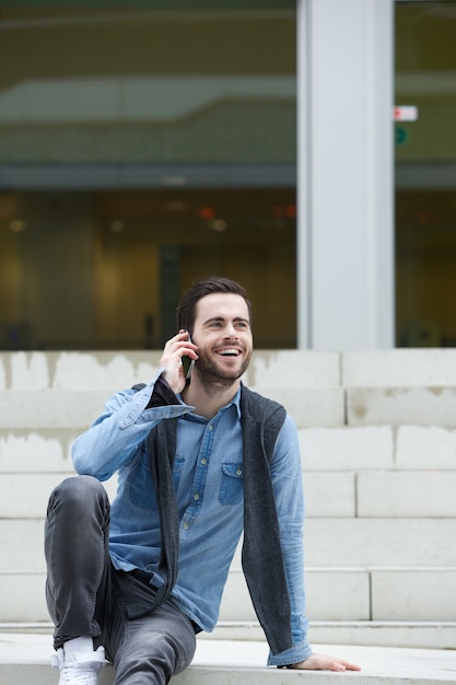 Young man calling with cellphone