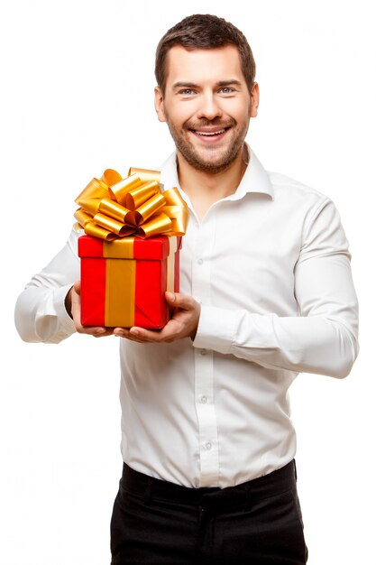 Young man carrying heart shaped box