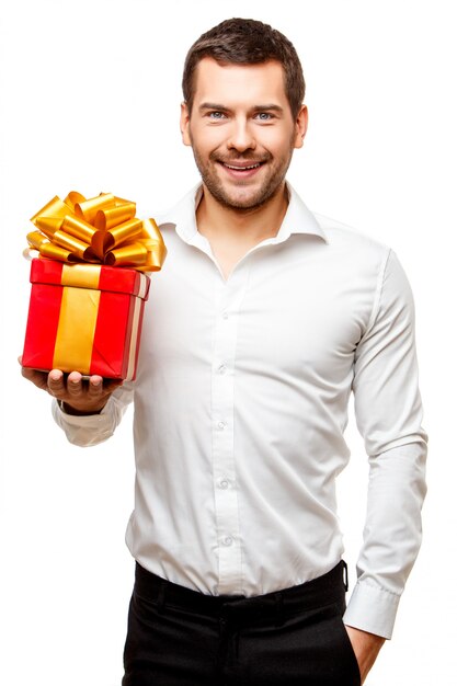 Young man carrying heart shaped box