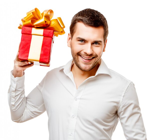 Young man carrying heart shaped box