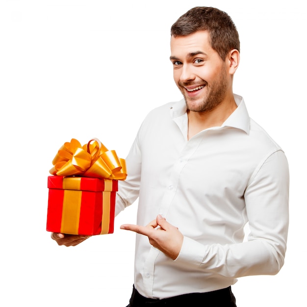 Young man carrying heart shaped box