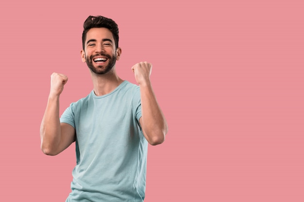 Young man celebrating a success