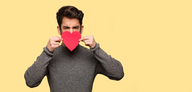 Young man celebrating valentines day