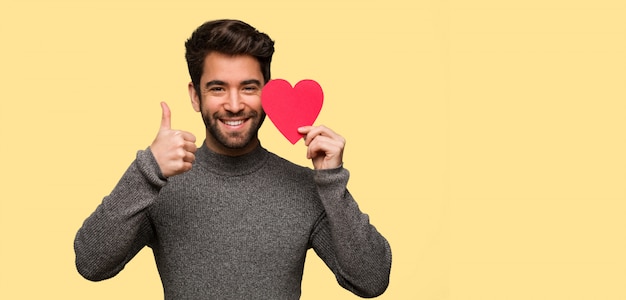 Young man celebrating valentines day