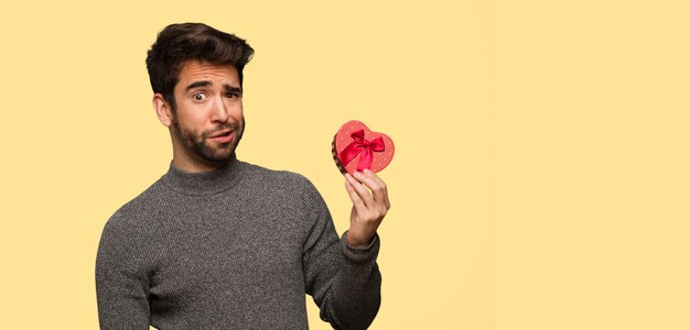 Young man celebrating valentines day