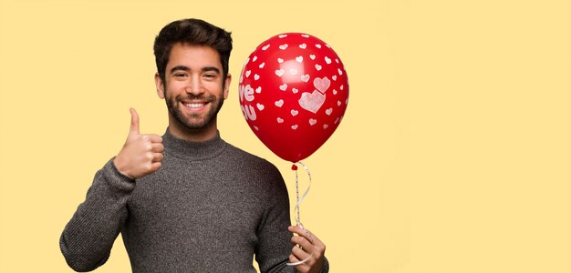 Young man celebrating valentines day