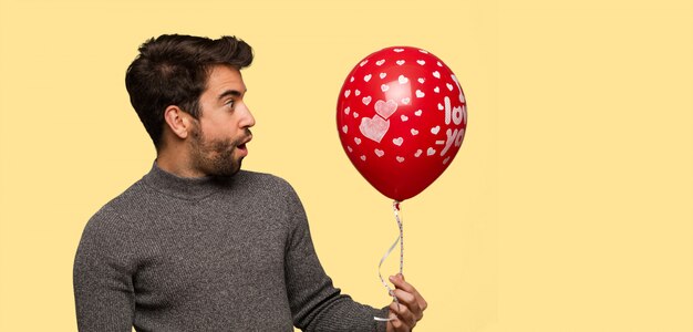 Young man celebrating valentines day