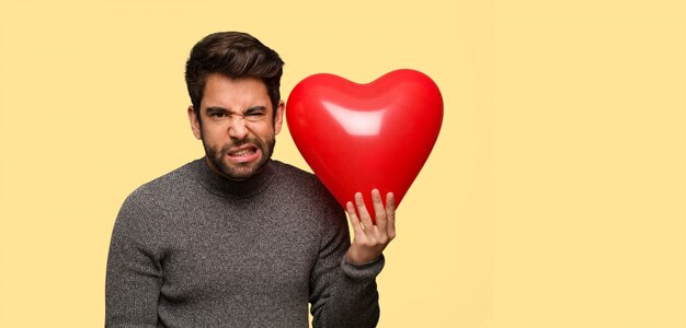 Young man celebrating valentines day