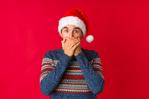 Young man on christmas day scared and afraid.