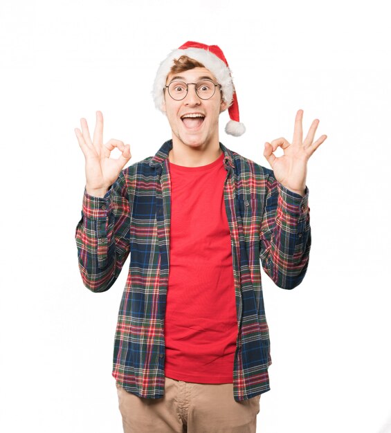 Young man at Christmas doing gestures