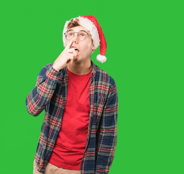 Young man at Christmas doing gestures