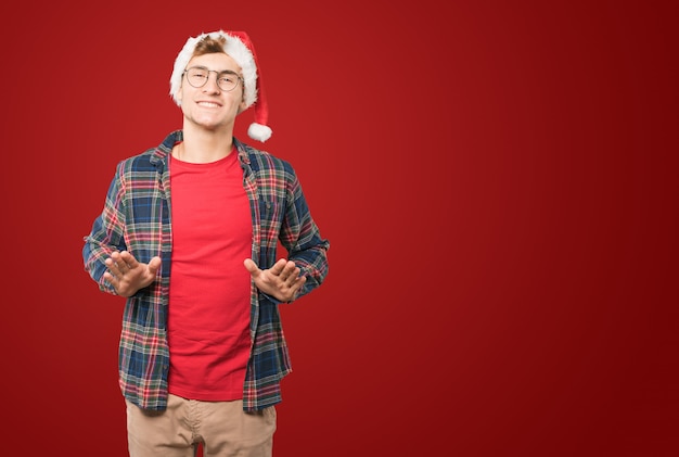 Young man at Christmas doing gestures