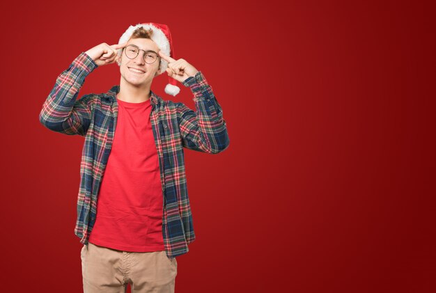 Young man at Christmas doing gestures