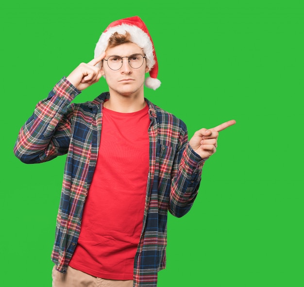 Young man at Christmas doing gestures