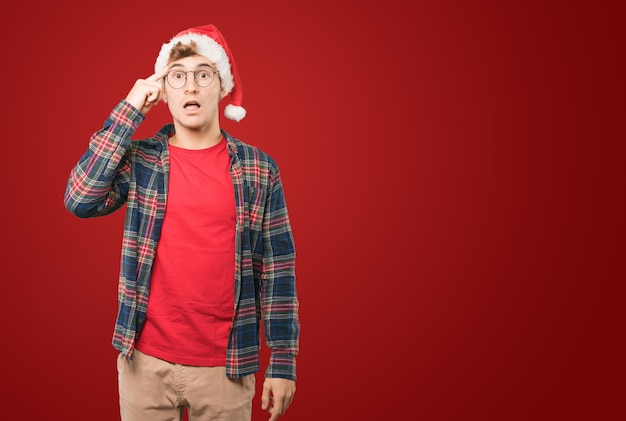 Young man at Christmas doing gestures