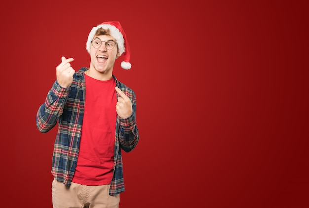 Young man at Christmas doing gestures