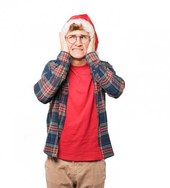 Young man at Christmas doing gestures