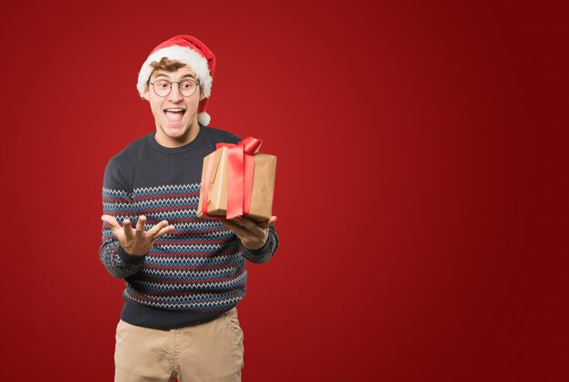 Young man at Christmas doing gestures