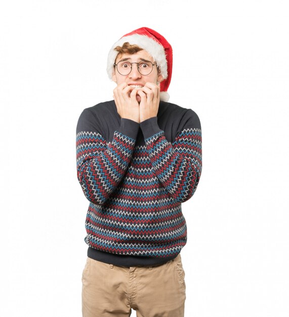 Young man at Christmas doing gestures