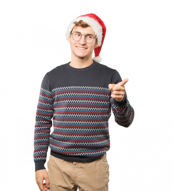 Young man at Christmas doing gestures