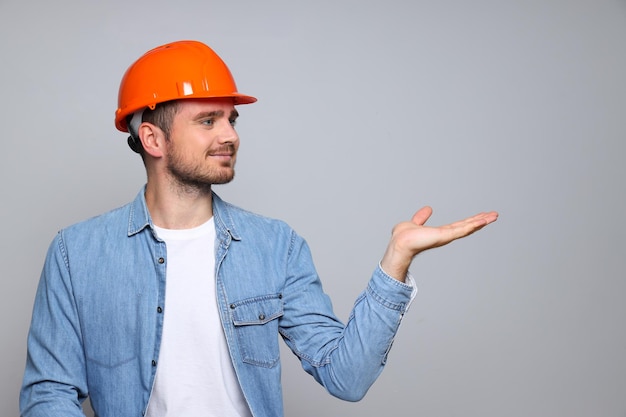 Young man civil engineer in safety hat