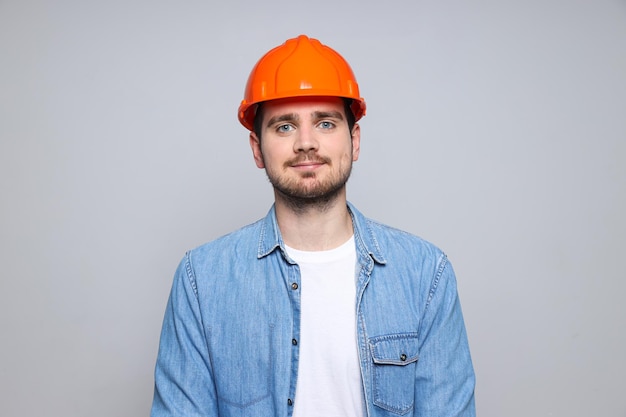 Young man civil engineer in safety hat