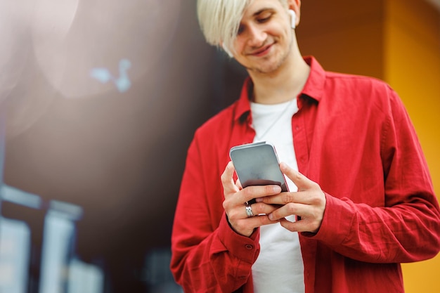 Young man communicating through mobile smart phone Communication concept