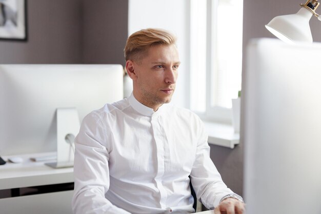 Young man at the computer