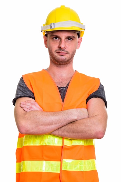 young man construction worker with arms crossed