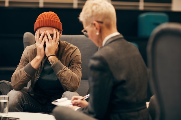 Young man consulting with the doctor