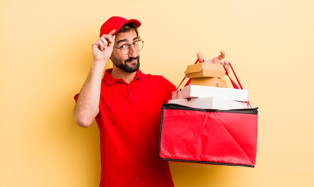 Young man deliver take away fast food concept