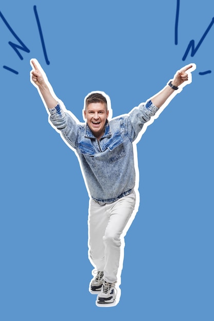 Young man in denim clothes jumping and dancing