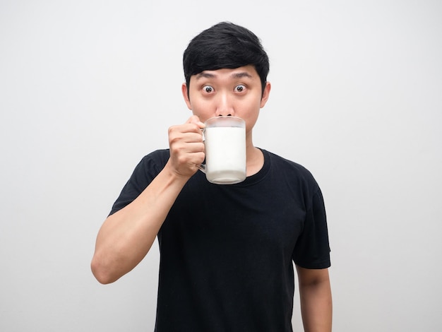 Young man drinking milk for healthy isolated