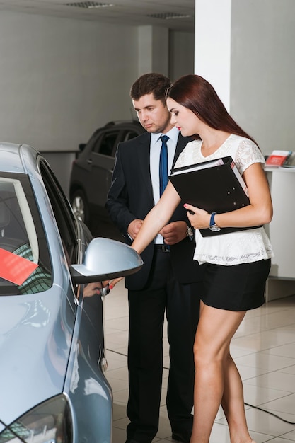 Young man driving a car Start a business trip Test drive a new auto