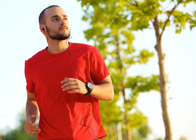 Young man enjoying a run outdoors 