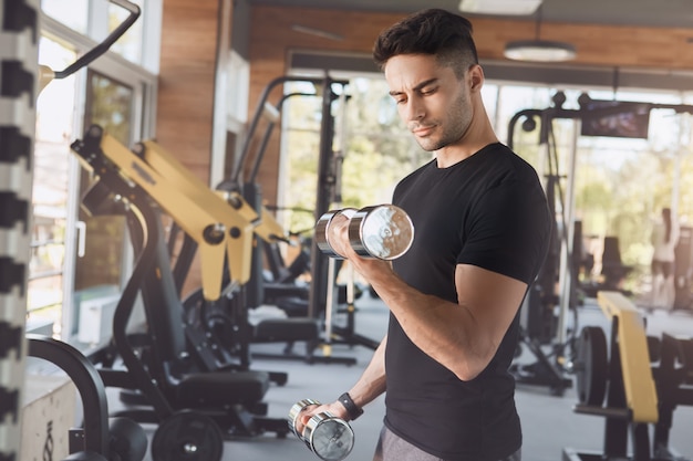 Young man exercise in the gym healthy lifestyle